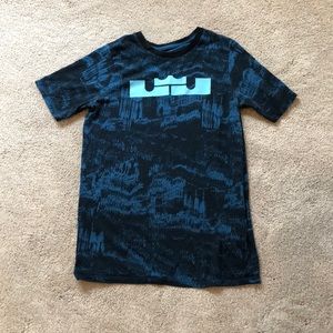 Blue Nike LeBron James logo shirt